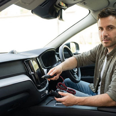 rallonge allume cigare utilisée par conducteur pour alimenter appareil dans voiture