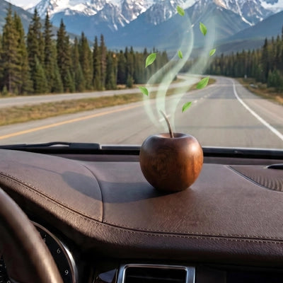 Diffuseur de parfum pour voiture  posé sur le tableau de bord, offrant une diffusion continue 