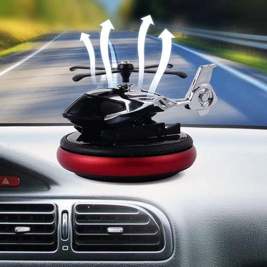 diffuseur parfum voiture solaire à hélice rouge sur tableau de bord voiture