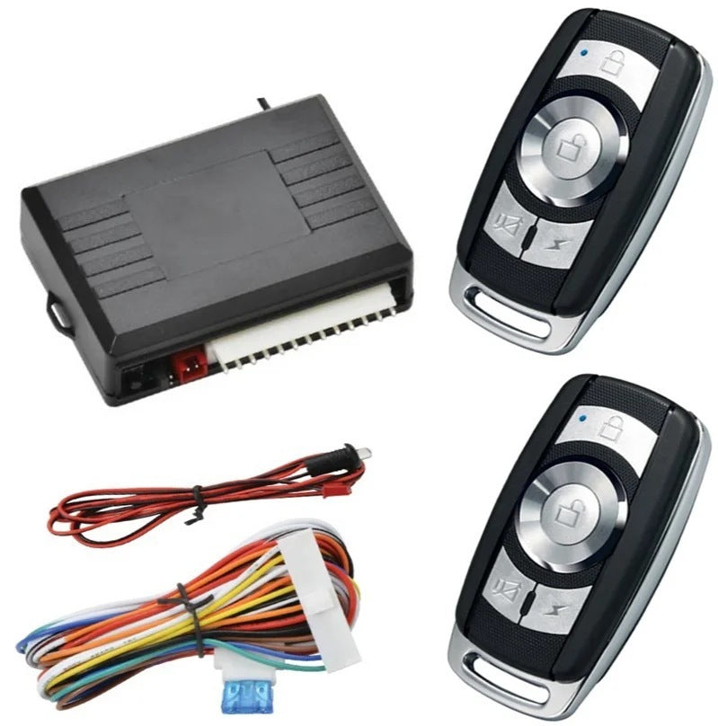 Kit verrouillage centralisé modèle F comprend 1 boite commande 2 télécommandes 1 jeu fils 1 indicateur LED