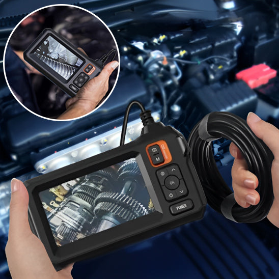 Mécanicien utilise camera endoscopique pour inspecter dents roulements  moteur voiture