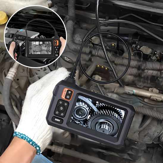 Mécanicien utilise camera endoscopique pour inspecter roulements  moteur voiture