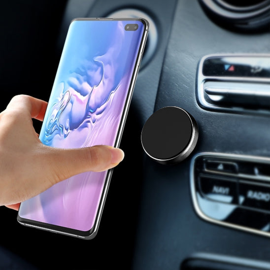 support téléphone voiture magnétique argent fixé sur grille d'aération utilisation pratique avec téléphoné