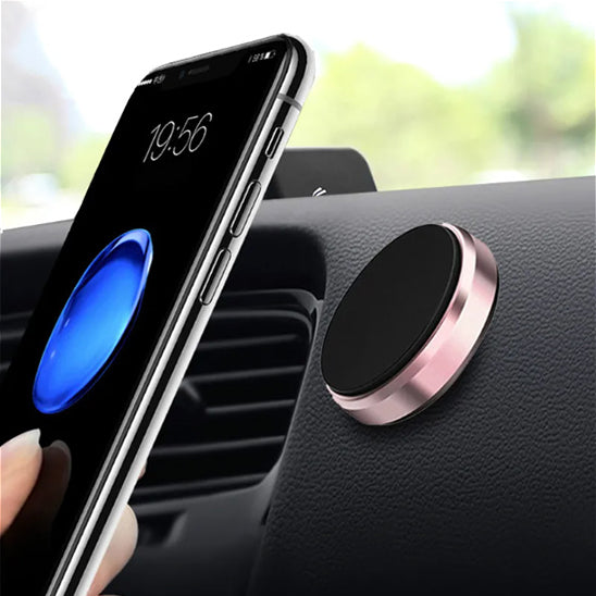 support téléphone voiture magnétique or rose fixe sur grille d'aération utilisation pratique avec téléphone